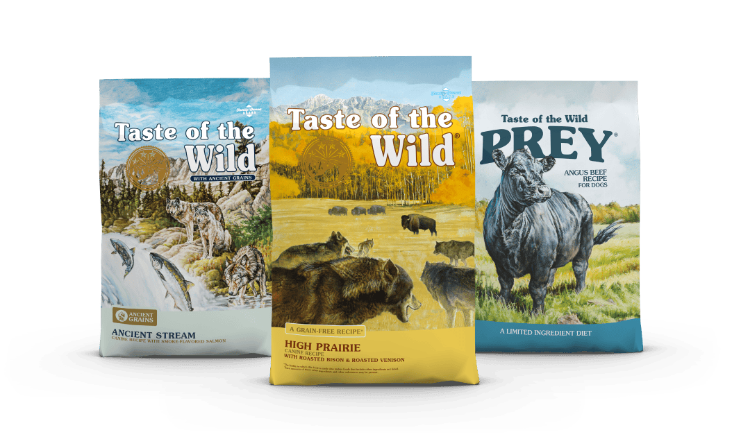 A bag of Taste of the Wild High Prairie in front of a bag of Taste of the Wild Ancient Stream and a bag of Taste of the Wild Prey Angus Beef Recipe.