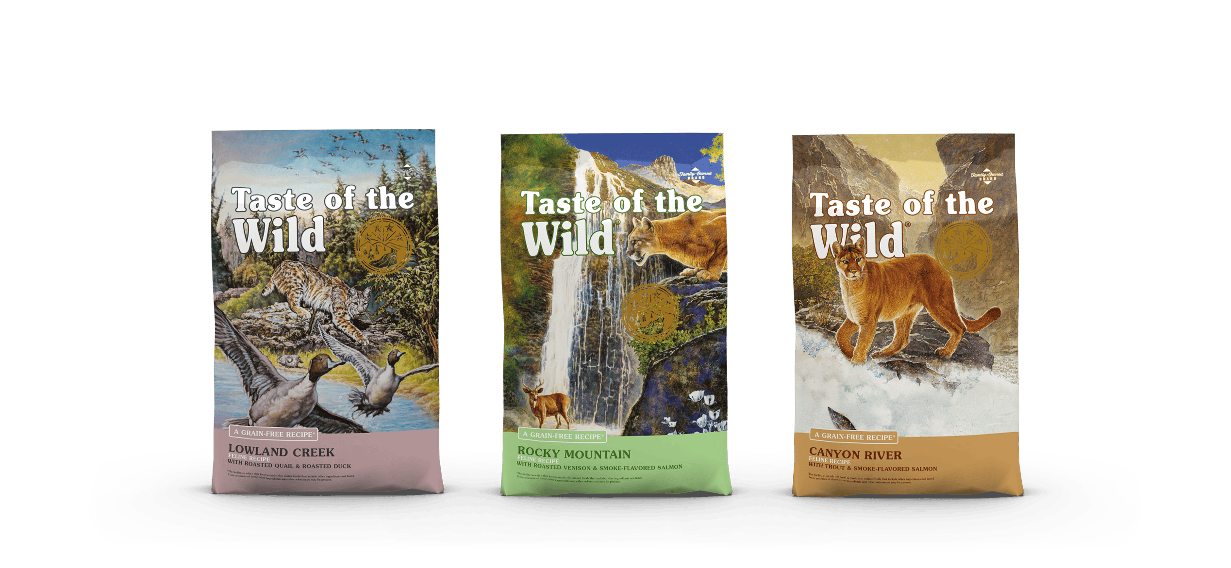 Three different bags of Taste of the Wild grain-free feline recipe lined up next to each other.